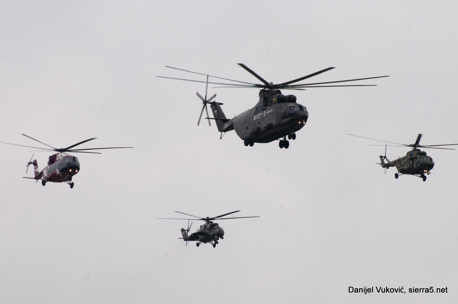 Fly-by of helicopters in flying program opening